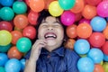 Children happiness emotion in colorful on ball pool