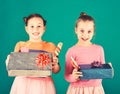 Children with happy faces pose with candies and presents Royalty Free Stock Photo