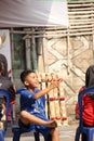 children with happy faces take part in a traditional competition to commemorate Indonesia's independence day