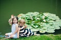 Children happy smile on green lake landscape Royalty Free Stock Photo