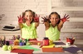 Children happy smiling with colored hands