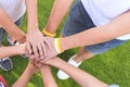 Children have combined hands together. Team work. Love and family concept, unity. Mutual assistance and friendship Royalty Free Stock Photo