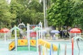 Children have fun at colorful playground in water park