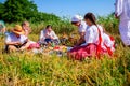 Children are having breakfast at traditional wheat harvest Royalty Free Stock Photo