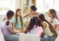 Several children having a discussion in group therapy with their school psychologist Royalty Free Stock Photo