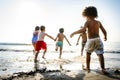 Children having fun on the beach Royalty Free Stock Photo