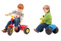 Children having fun riding on kids bikes Royalty Free Stock Photo