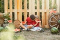 Children having picnic in summer. Children play and eat watermelon. Royalty Free Stock Photo