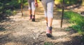 Children hiking in mountains or forest with sport hiking shoes. Royalty Free Stock Photo