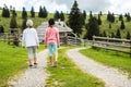 Children hiking in mountains or meadows with sport hiking shoes Royalty Free Stock Photo