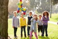 Children Hitting Pinata At Birthday Party Royalty Free Stock Photo