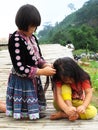 Children hmong tribal and child thai karen ethnic on Mon Jam village mountain hill posing portrait for take photo playing with