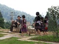 Children hmong tribal and child thai karen ethnic on Mon Jam village mountain hill posing portrait for take photo playing with