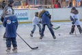 Children with hockey sticks playing hockey at the festival