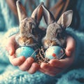 Children hold cute rabbit and easter eggs