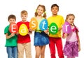 Children hold egg shape colourful cards together Royalty Free Stock Photo