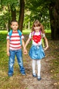 Children hold hands. Students go to school. The concept is back Royalty Free Stock Photo