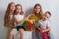 Children holding a basket of fresh fruit and vegetables healthy food Royalty Free Stock Photo