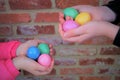 Children holding Easter eggs