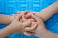 Children holding hands and playing together with unity and teamwork Royalty Free Stock Photo