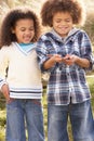 Children Holding Worm Outdoors Royalty Free Stock Photo