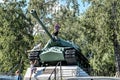 Russia, Priozersk, August 2020. Children near a heavy tank mounted on a pedestal. Royalty Free Stock Photo