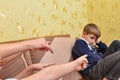 Children humiliate the boy and poke a finger at him in protest of communication Royalty Free Stock Photo