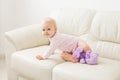 Children, infant and childhood concept - beautiful smiling baby is playing Royalty Free Stock Photo