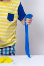 Children inflates a big bubble from a slime. Girl and boy play with slime.