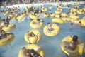 Children in inner tubes floating Raging Waters waterpark,Los Angeles, CA