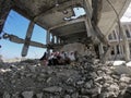 Children inside a school destroyed by the war in Yemen