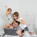 Children interfere dad freelancer quarantined. Royalty Free Stock Photo