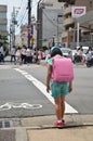 Children japanese girl waiting cross over road