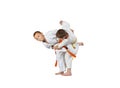 Children in judogi are training judo throws Royalty Free Stock Photo