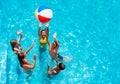 Children jump, play in pool with inflatable ball Royalty Free Stock Photo