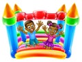 Children Jumping on Bouncy Castle