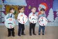 The children . Kindergarten participants take part in a New Year`s event. Cute boys dressed in festive costumes of suit . cheerfu