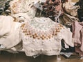 Children knitted sweater lies on a shelf in a clothing store