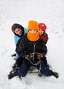 Children laughing on sledge