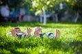 Children laying on grass. Family picnic in spring park Royalty Free Stock Photo