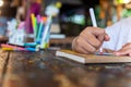 Children learn coloring and painting in classroom.