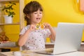 Children learn english online at home. Homeschooling and distance education for kids. Royalty Free Stock Photo