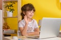 Children learn english online at home. Homeschooling and distance education for kids. Royalty Free Stock Photo