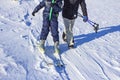 Children learn to snowboard on the mountainside on a clear day Royalty Free Stock Photo