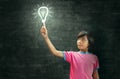 Children lighting and blackboard Royalty Free Stock Photo