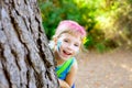 Children little girl happy playing in forest tree Royalty Free Stock Photo