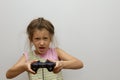 Children little girl holding joystick happy play video game Royalty Free Stock Photo