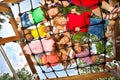 Children look though gridlines of playground