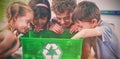 Children looking in green box Royalty Free Stock Photo
