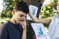 Children are looking for a missing dog, putting up posters Royalty Free Stock Photo